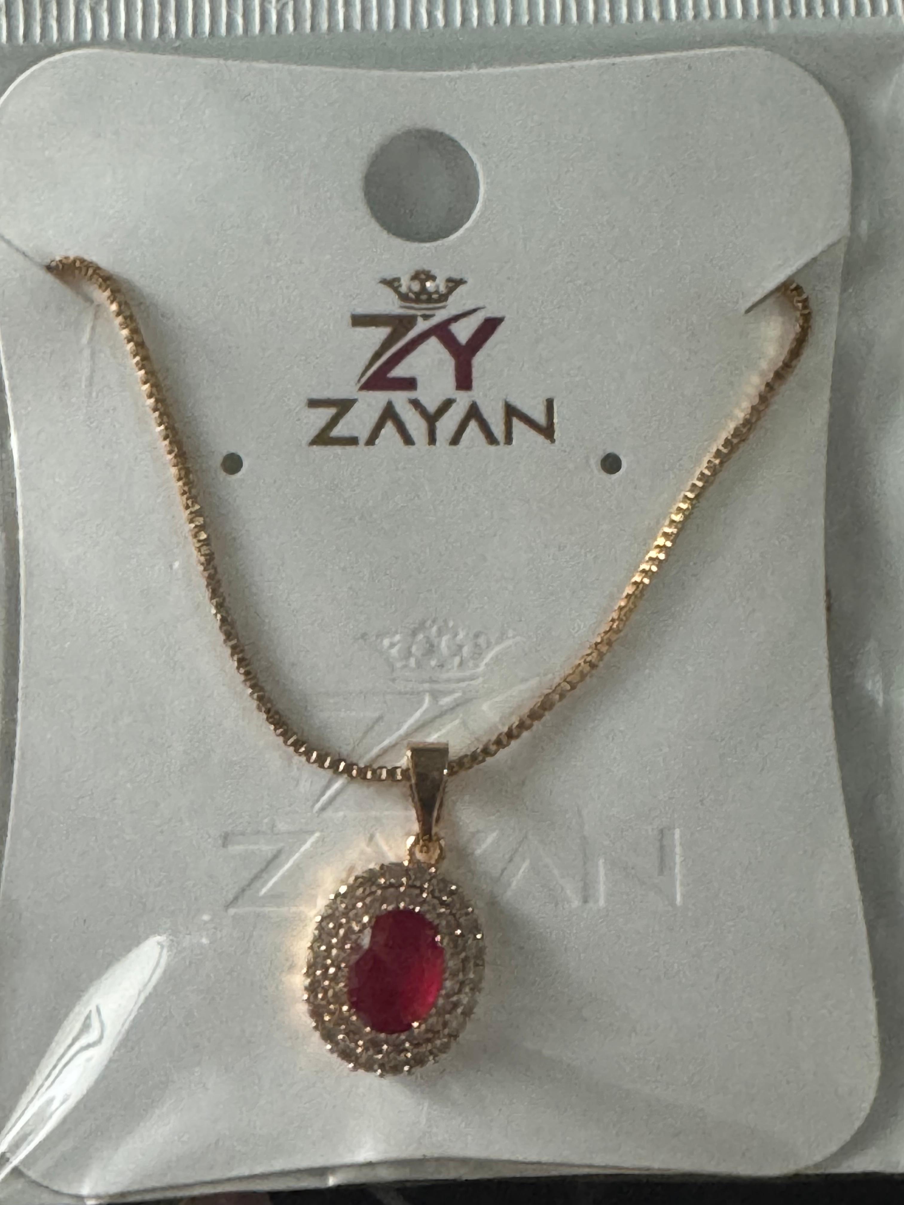 Royal Red Oval Pendant Necklace – Gold Chain with Sparkling Stone Halo