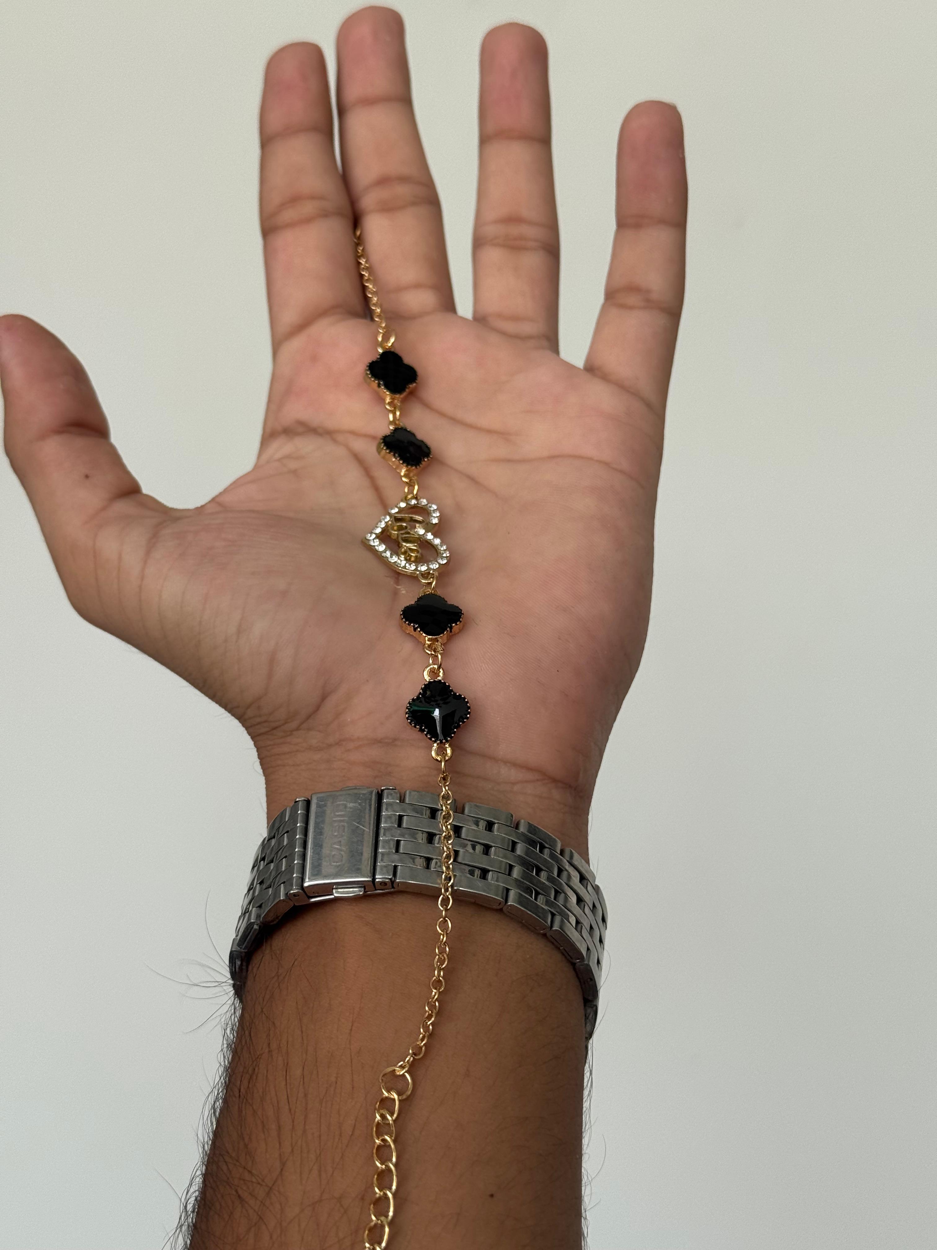 Black Clover Charm Bracelet with Gold Chain & Crystal Accent – Elegant Wristwear